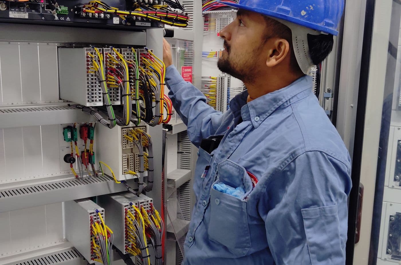 Wire Men electrician in work uniform on a job in Surat