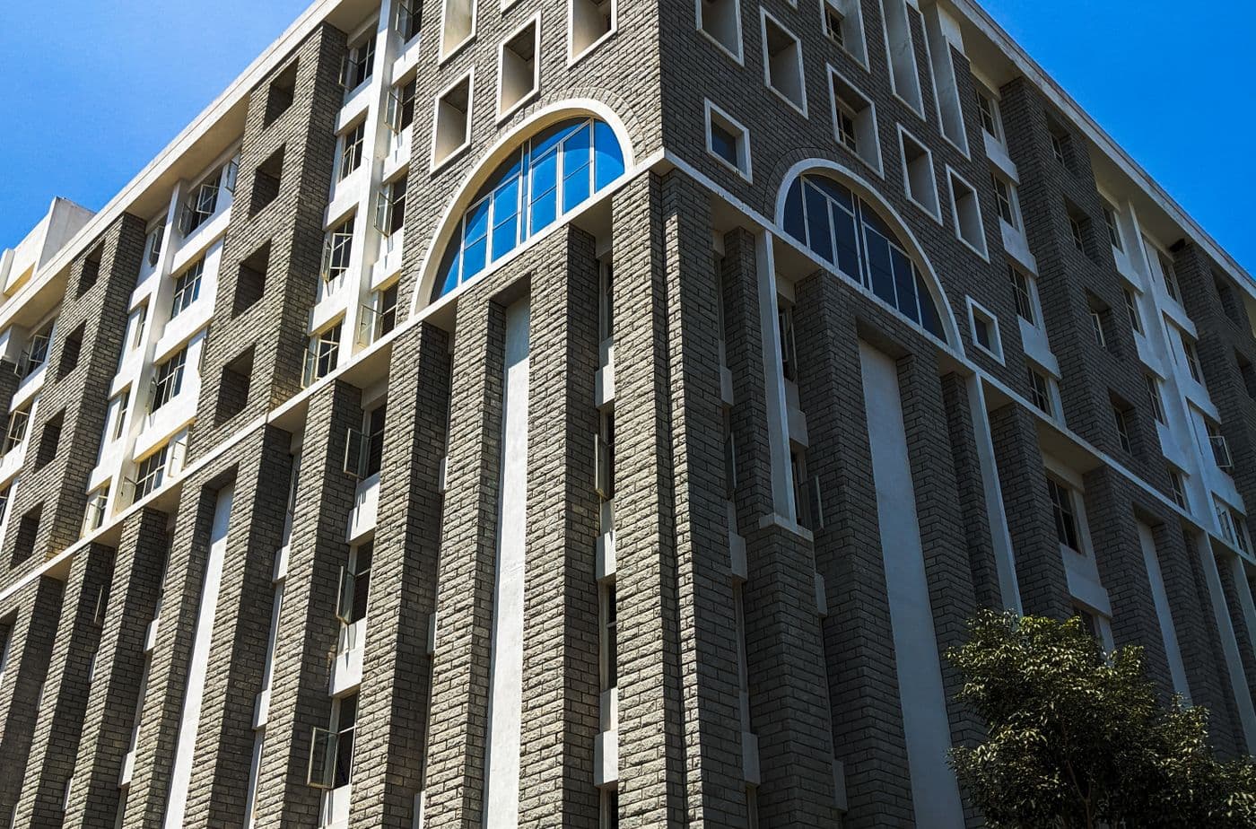 Glass-fronted residential tower in the Vesu area of Surat